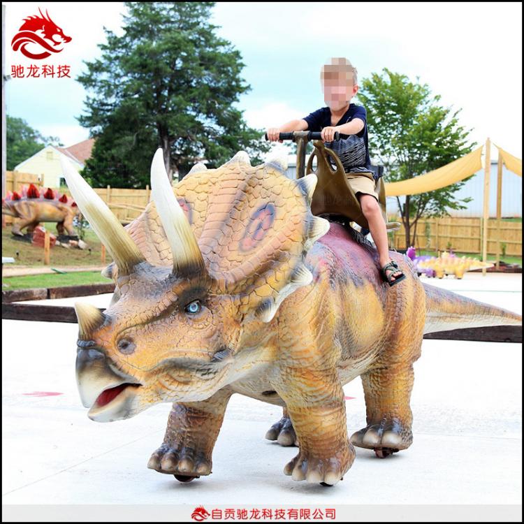 大型仿真恐龍坐騎工廠電動(dòng)恐龍游樂車廣場(chǎng)公園游樂園行走恐龍車