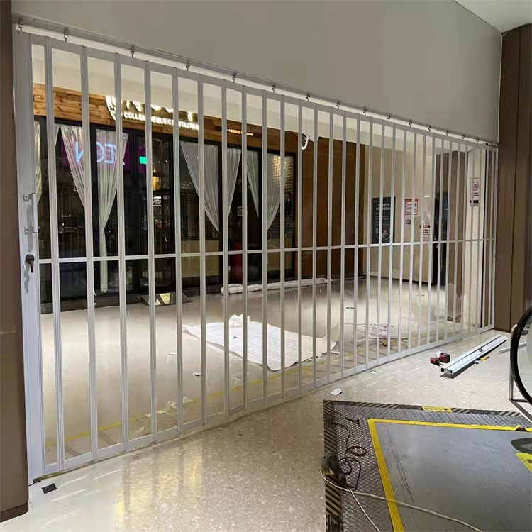 電動手動工業(yè)門折疊門消防車庫門鋼制折疊門 品質(zhì)保證