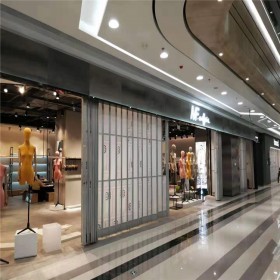 鋁合金水晶折疊門電動手動廠家批發(fā)卷簾門四川依錦門業(yè)支持定做出廠單價商場專用門